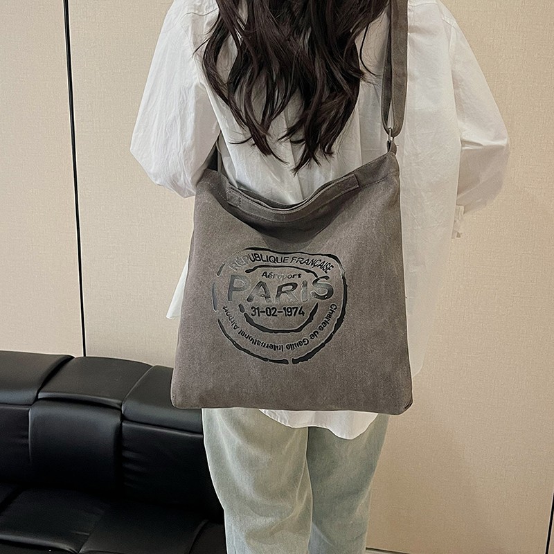 Cross-border students' hand-held canvas bag for class, fashionable lettered trendy tote bag, large-capacity commuting single-shoulder bag for women details Picture
