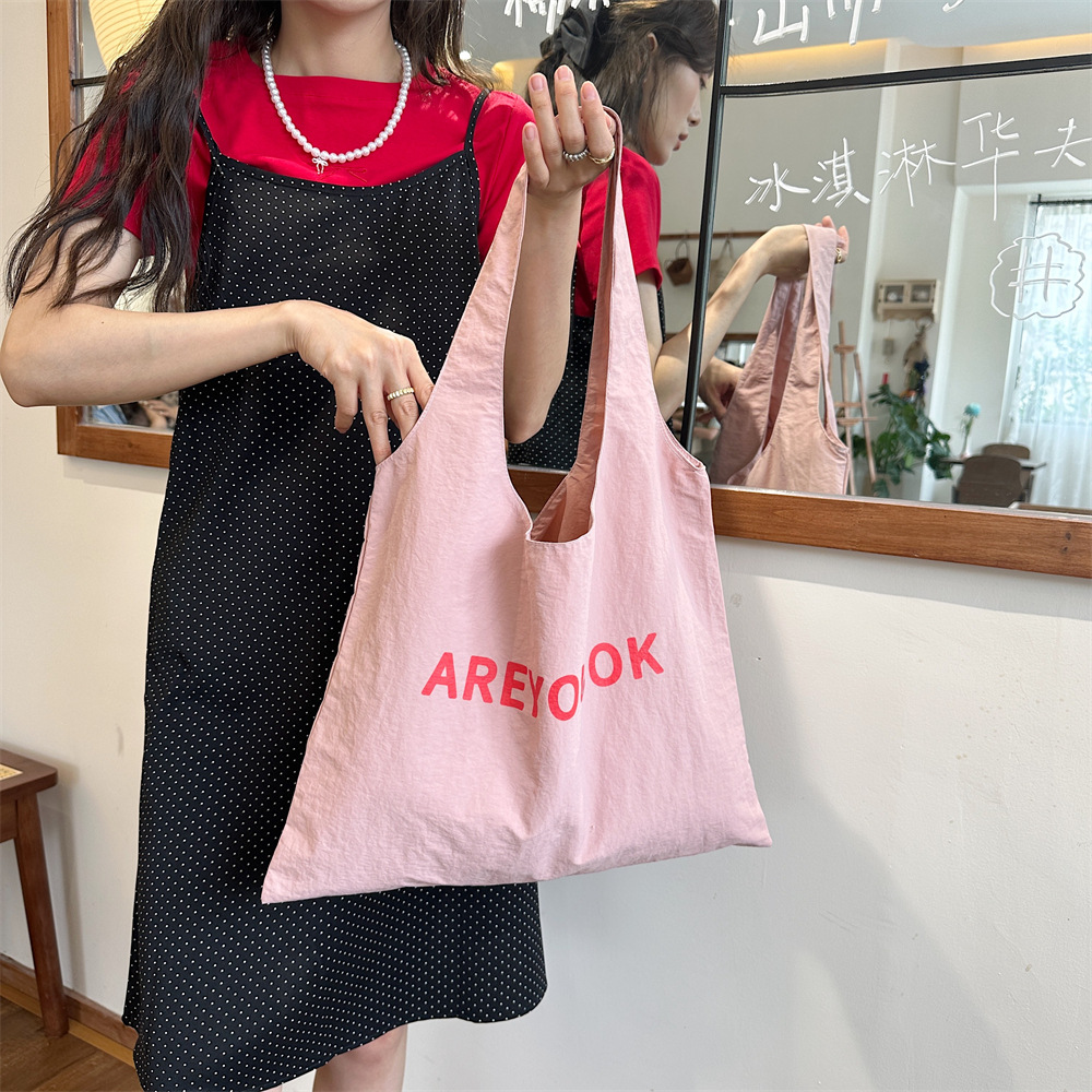 46203 New niche letter-printed single-shoulder bag, large capacity design, versatile fabric bag, women's canvas bag, shopping bag Application Scenario