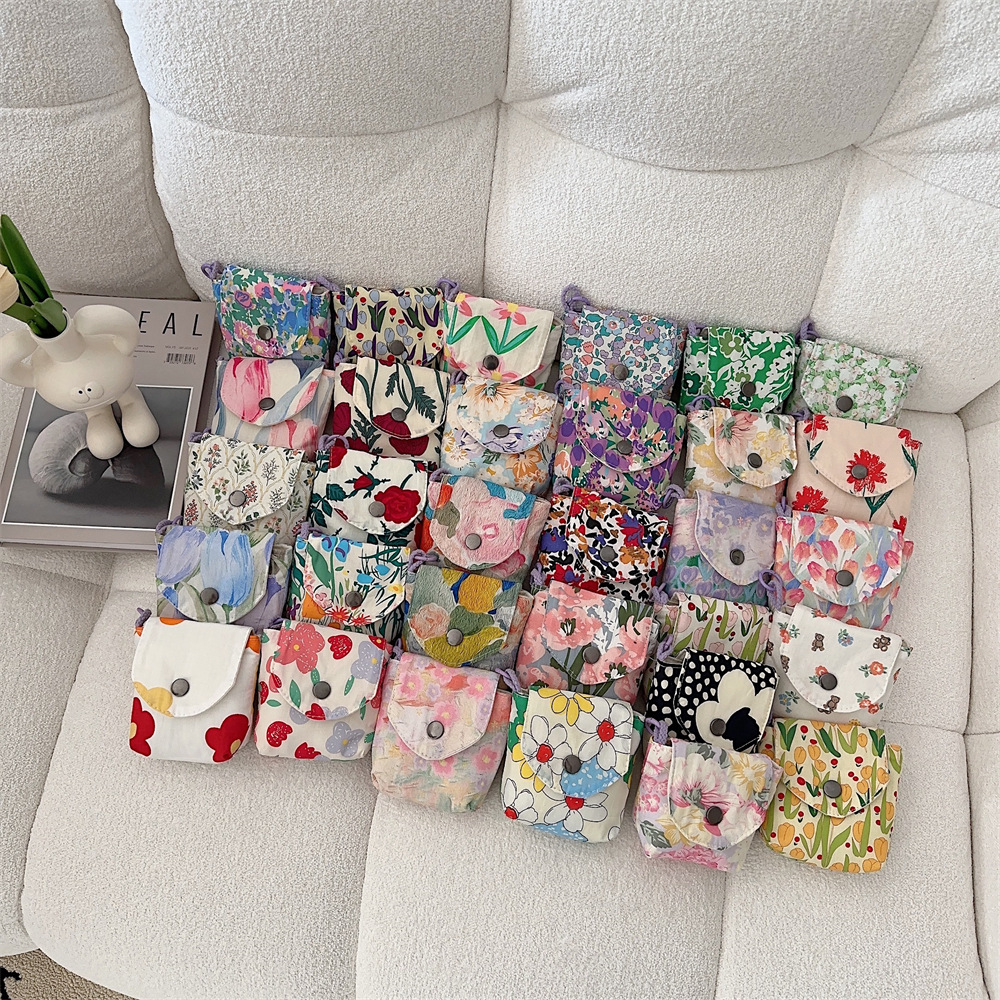 44113 Portable small mini storage bag, cute floral print portable student storage sanitary napkin bag storage bag full figure