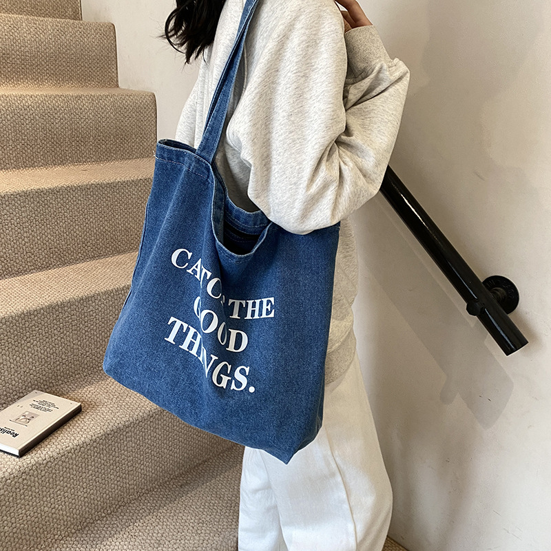 The new, niche and retro denim underarm bag with letters and the casual, fashionable and laid-back tote bag are selling well Application Scenario