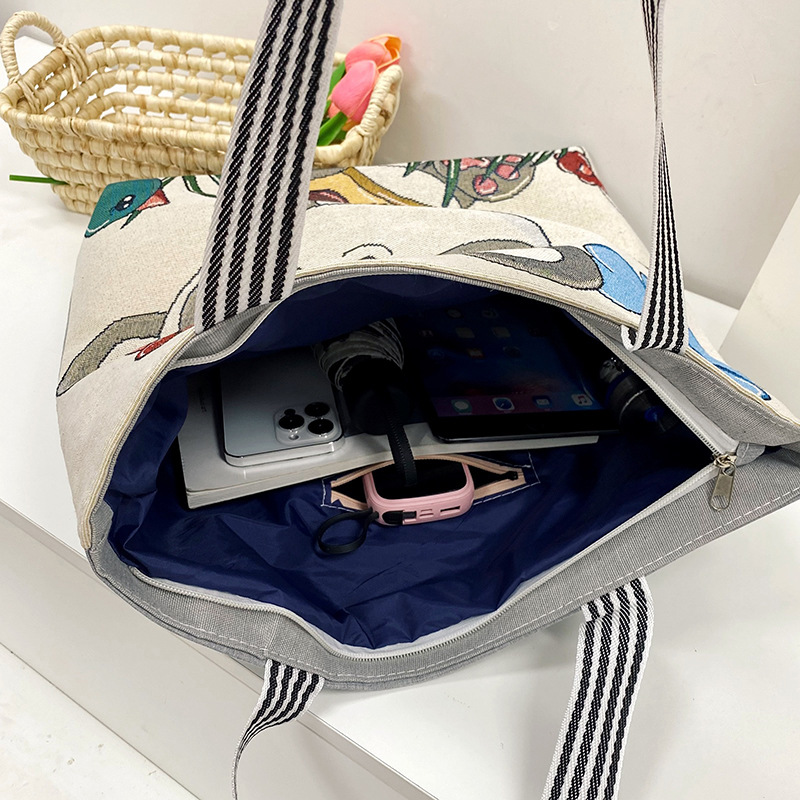 Cross-border single-shoulder handbag, cartoon cute animal print tote bag, linen embroidery casual commuting underarm bag Application Scenario