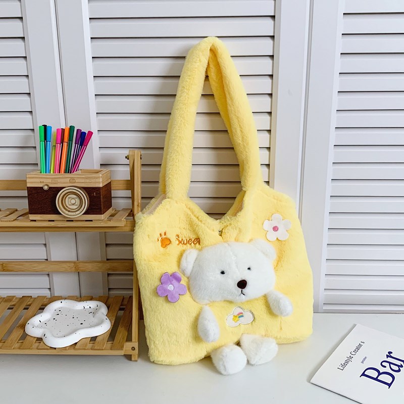 A Korean version of a fresh and cute three-dimensional bear named MAO MAO hand-carried bag with a girlish heart. A large-capacity single-shoulder storage bag for students going out details Picture