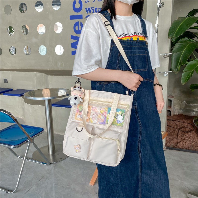 Large-capacity Japanese-style single-shoulder canvas bag for girls, versatile crossbody, ins, a tote bag for junior high school students' classes, and a schoolbag for after-school tutoring Specification drawing
