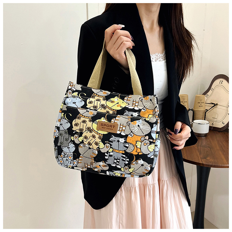 Korean-style fresh and light printed handbag, lunch box for female office workers, lunch box bag, canvas small bag, hand-carried bag, cross-border Specification drawing