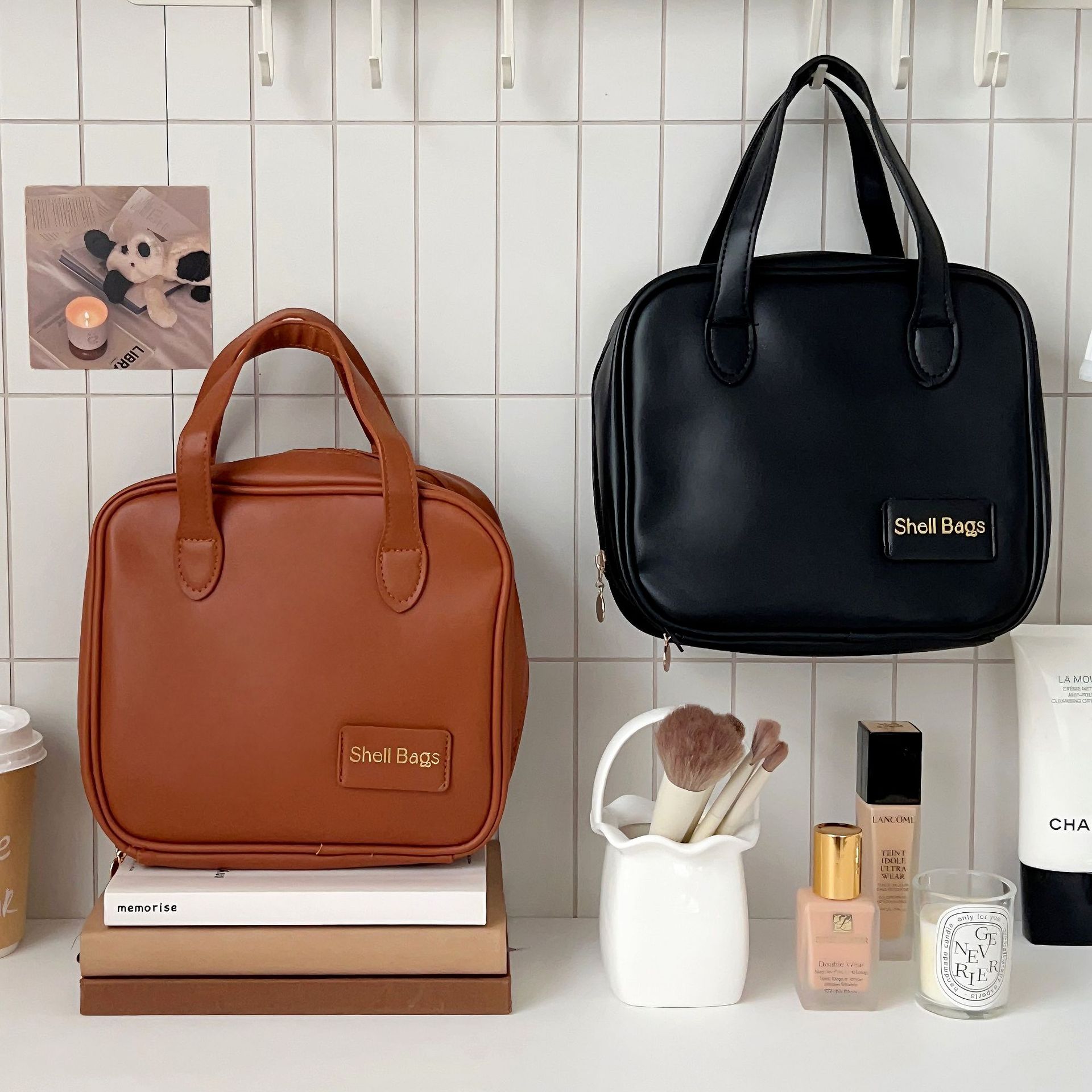 A high-end portable hand-held cosmetics storage bag with large capacity for women in 2024, and a travel toiletries bag with compartments Item Picture