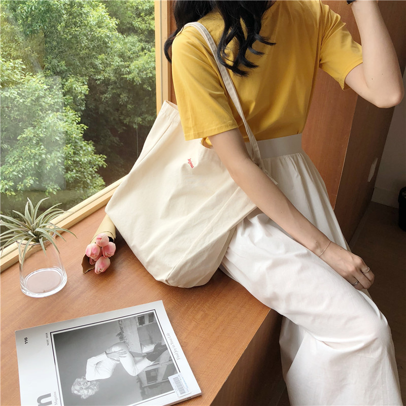 The new C34 ins single-shoulder bag, embroidered canvas bag, Bonjour capacity shopping cloth bag, hand-carry, simple and fashionable Specification drawing