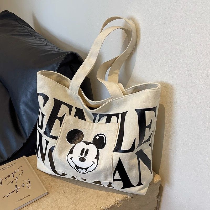 Large-capacity canvas bag for women, 2024 new letter-shaped Mickey Mouse handbag, shopping bag, college student single-shoulder tote bag Application Scenario