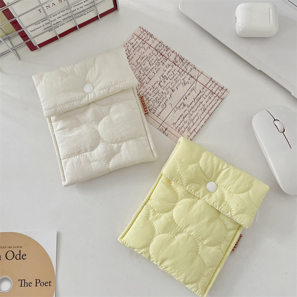 55151 Portable and simple candy-colored sanitary napkin storage bag for menstruation Application Scenario