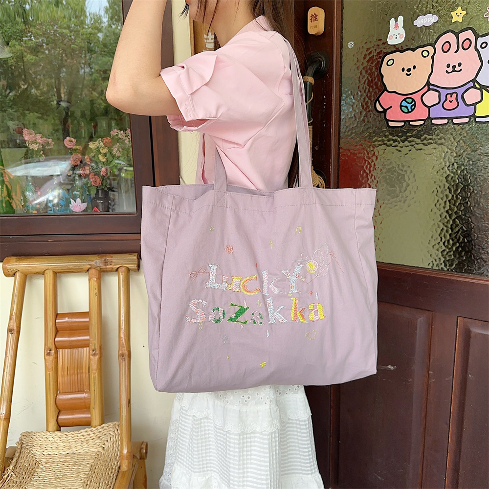 4591 Summer canvas embroidery casual and laid-back style ins Artistic hand-held single-shoulder bag shopping bag Canvas schoolbag Specification drawing