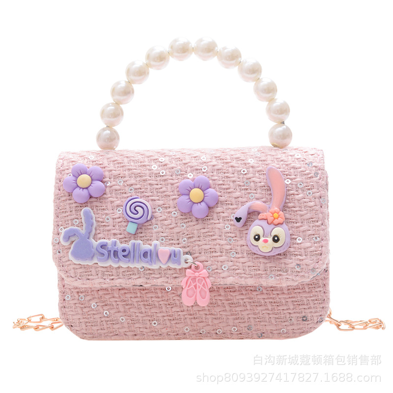 A new style of cute cartoon mini handbag for little girls. It's a trendy single-shoulder crossbody bag for children Item Picture