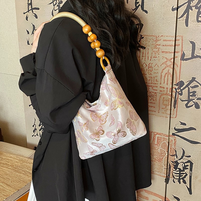 The versatile and high-end single-shoulder bag of 2024, the new Chinese-style tote hand-held bamboo joint bag, and the niche underarm bag are selling well among women Specification drawing