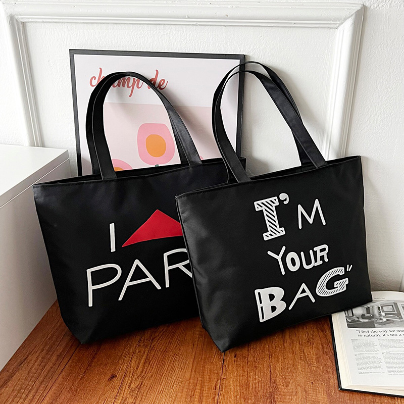 Wholesale of new large-capacity women's single-shoulder bags with logo printing, fashionable canvas bags, hand-held tote bags and women's shopping bags details Picture