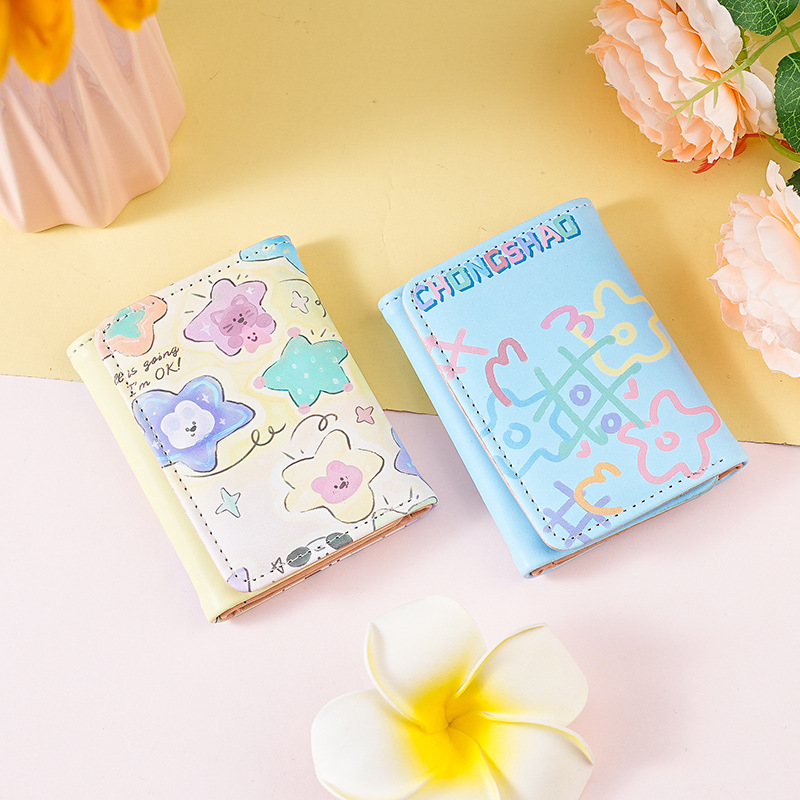 This is a new minimalist, colorful graffiti short, cute and niche design for women. It features a foldable, compact and multi-slot three-fold wallet full figure