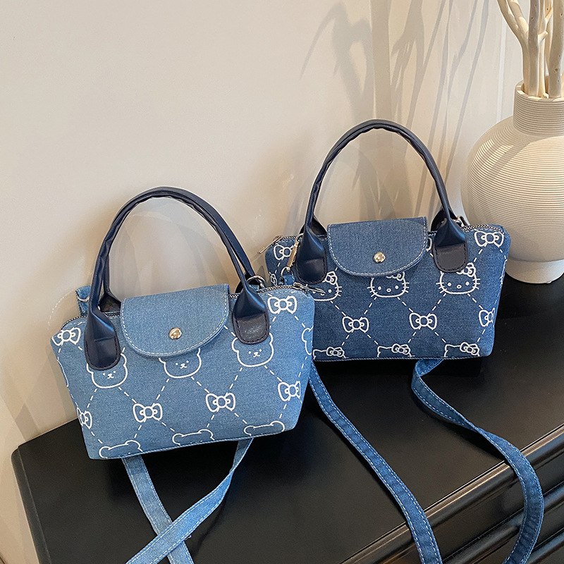 Fashionable single-shoulder crossbody bag 2025 new mini dumpling bag, cute and stylish denim printed kitten handbag for women full figure