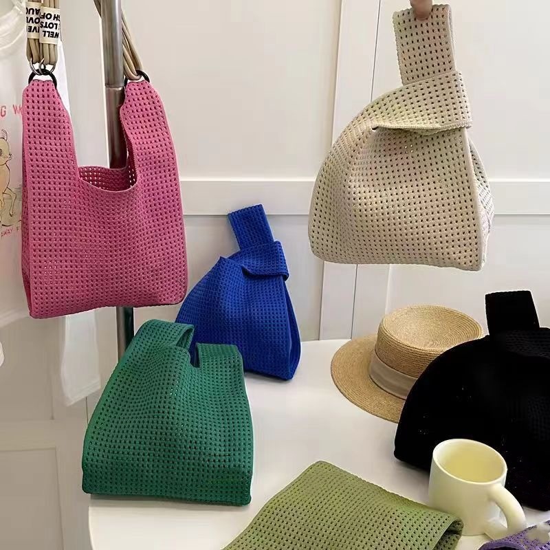 Korean chic simple and retro hollowed-out knitted handbag, shoulder bag, women's vest bag, open woolen bag, shopping bag full figure