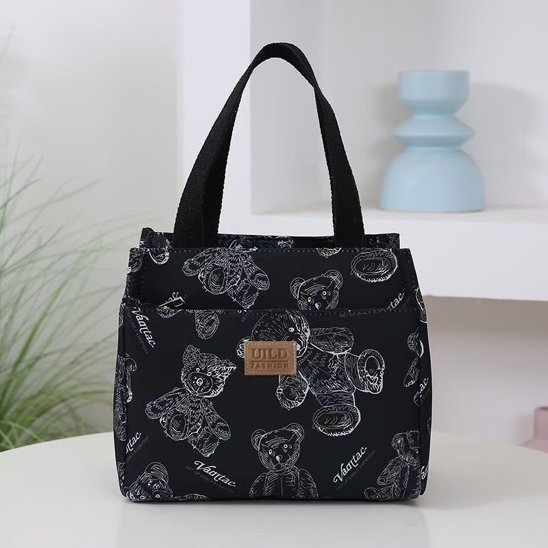 New handbag bento for mommy and office workers. Oxford cloth with rice for work. Fashionable lunch box with large capacity details Picture