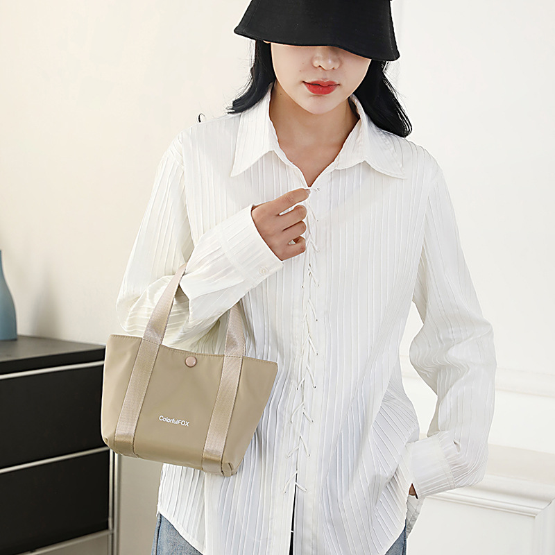 Colorful Fox's new summer women's makeup bag, Korean version fashionable and trendy clutch bag, mini and simple handbag details Picture