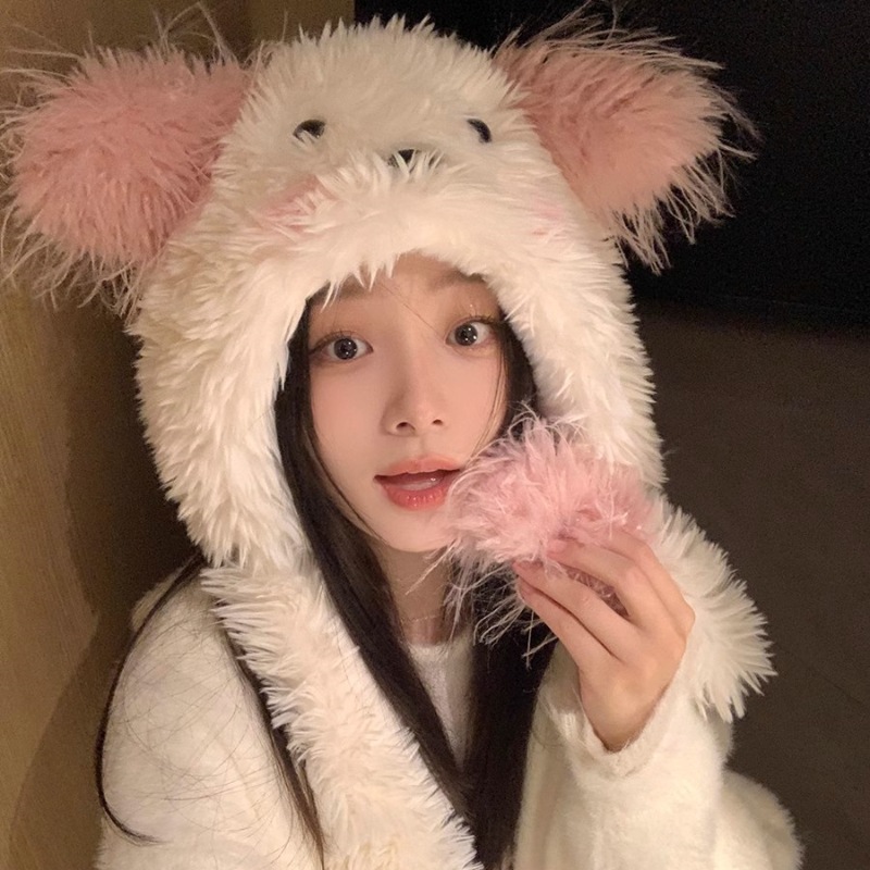 A cute cartoon plush hat for women in winter, thickened and warm, with ears that can move and a dog's big head around it details Picture