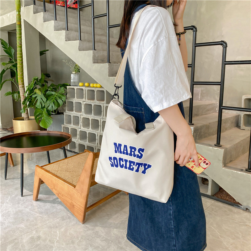 Canvas bag for women, single shoulder, ins crossbody, laid-back style, college student class bag, artistic Japanese style, large capacity, Hong Kong style, chic details Picture