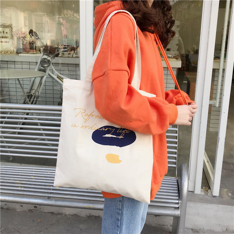 E131 canvas bag, Korean-style ins hand-held shoulder bag, color block letter graffiti shopping bag, female student's search for sources details Picture