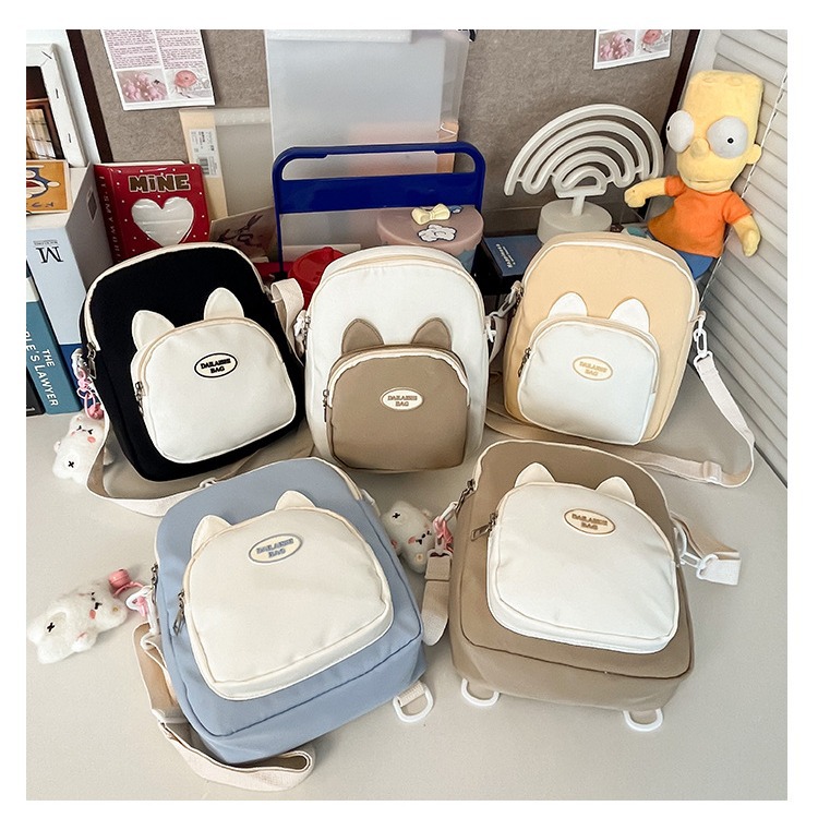 Summer cute little cat single-shoulder bag, double-sided new transparent pain bag, can hold 20cm cotton doll student backpack full figure
