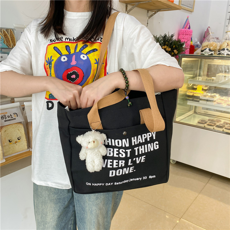 Large-capacity canvas bag for women, 2022 new style casual and laid-back school-style crossbody bag, hand-held tote bag, student schoolbag Application Scenario