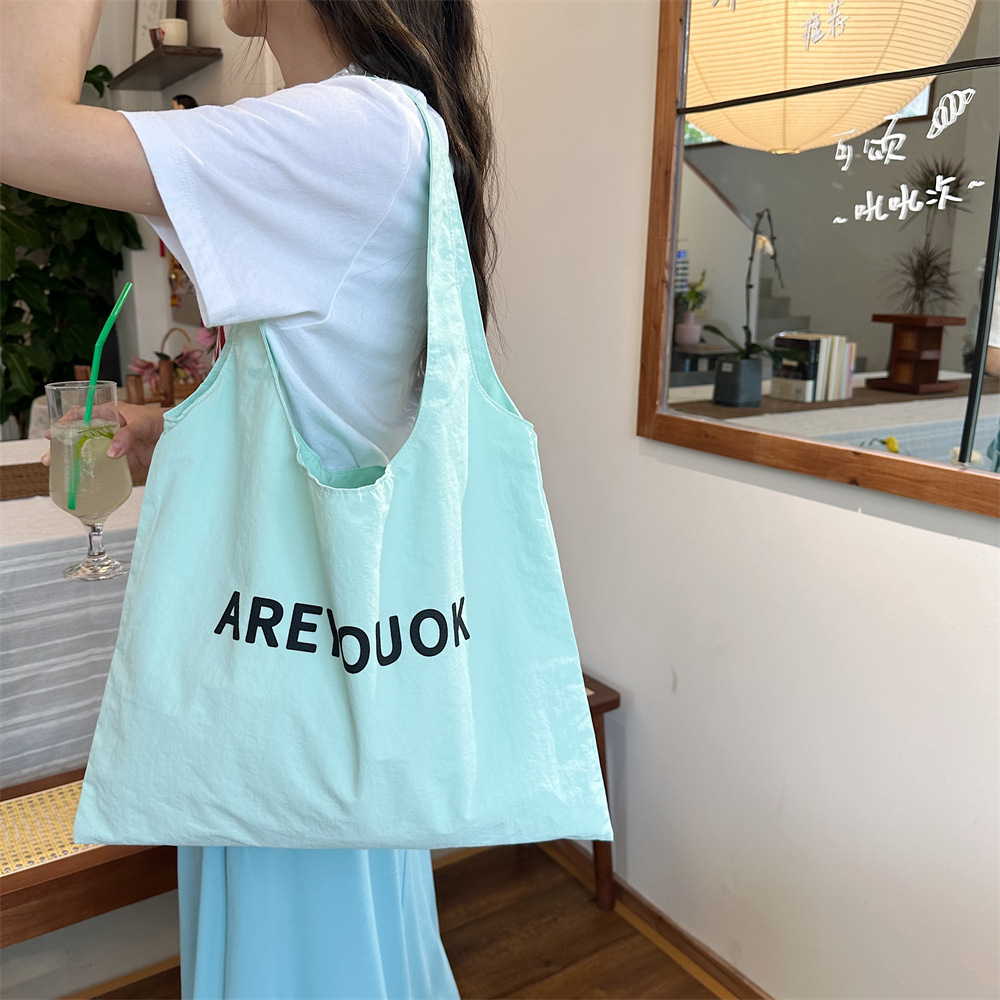 46203 New niche letter-printed single-shoulder bag, large capacity design, versatile fabric bag, women's canvas bag, shopping bag details Picture
