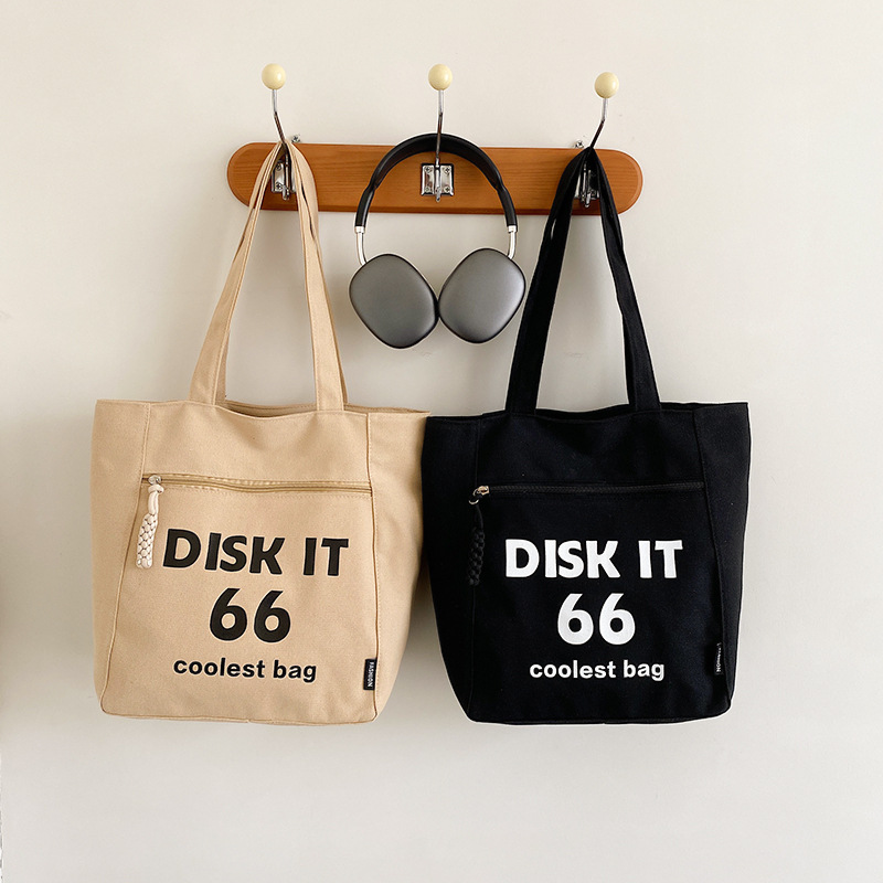 The new 2024 high-end textured canvas underarm bag for women is a trendy and stylish single-shoulder bag details Picture