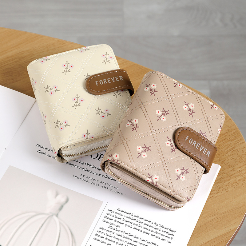 The new Korean-style simple short two-fold women's wallet from Ailun is a fashionable student multi-slot printed folding wallet full figure