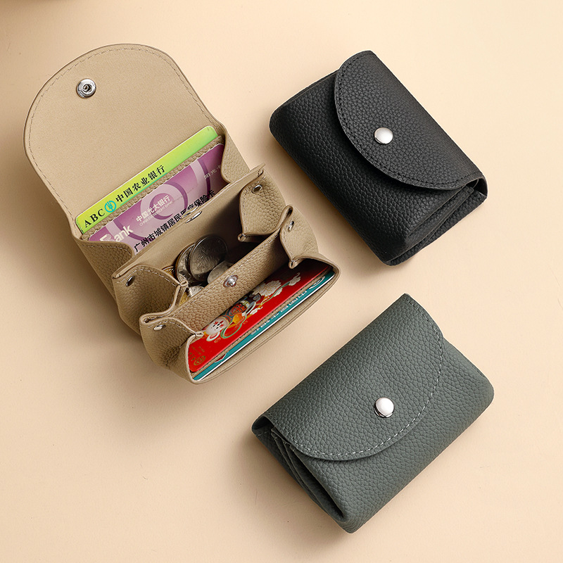Japanese and Korean creative pu lychee peel wallet, short and cute coin coin wallet, double-layer pu mini wallet for girls full figure