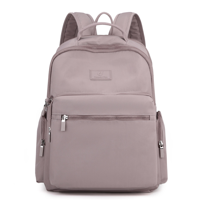 This is a large-capacity water-resistant nylon backpack for both men and women. It is fashionable for travel and leisure, and can be worn with a suitcase Item Picture