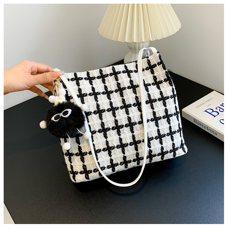 This year's popular bags are versatile for women. The 2023 new tweed bucket single-shoulder bag exudes a sense of sophistication and is a student commuting tote bag details Picture