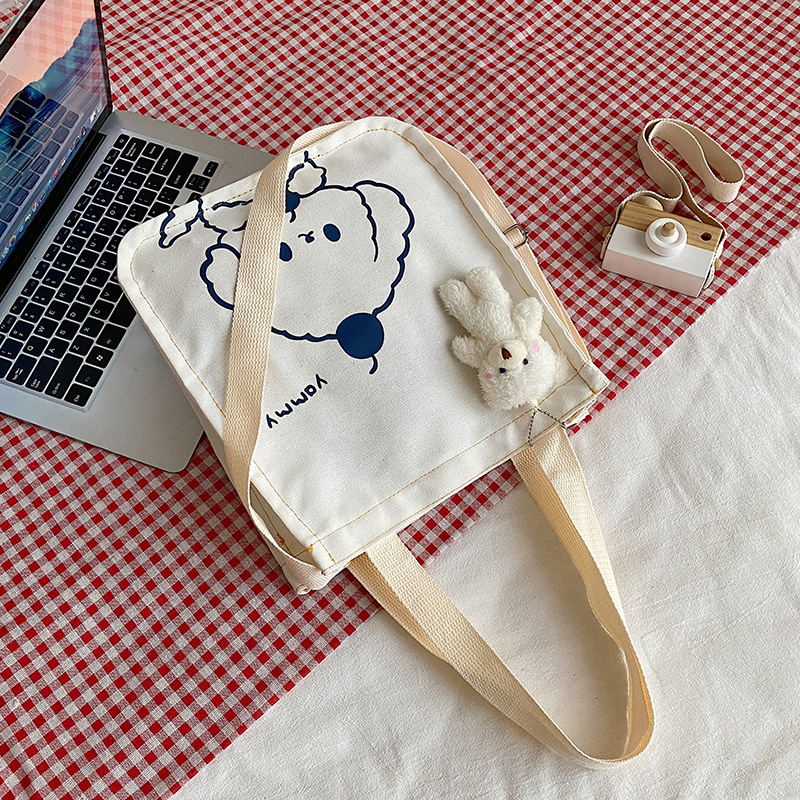 A new large-capacity Korean Instagram canvas bag for girls, a simple single-shoulder handbag for junior high school and primary school students details Picture