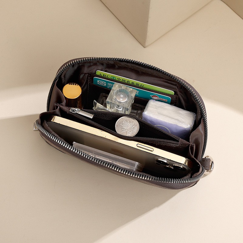 The new hand-held wallet for women is a long, simple, large-capacity zipper shell bag and a hand-held bag for mom. It can hold a mobile phone Specification drawing