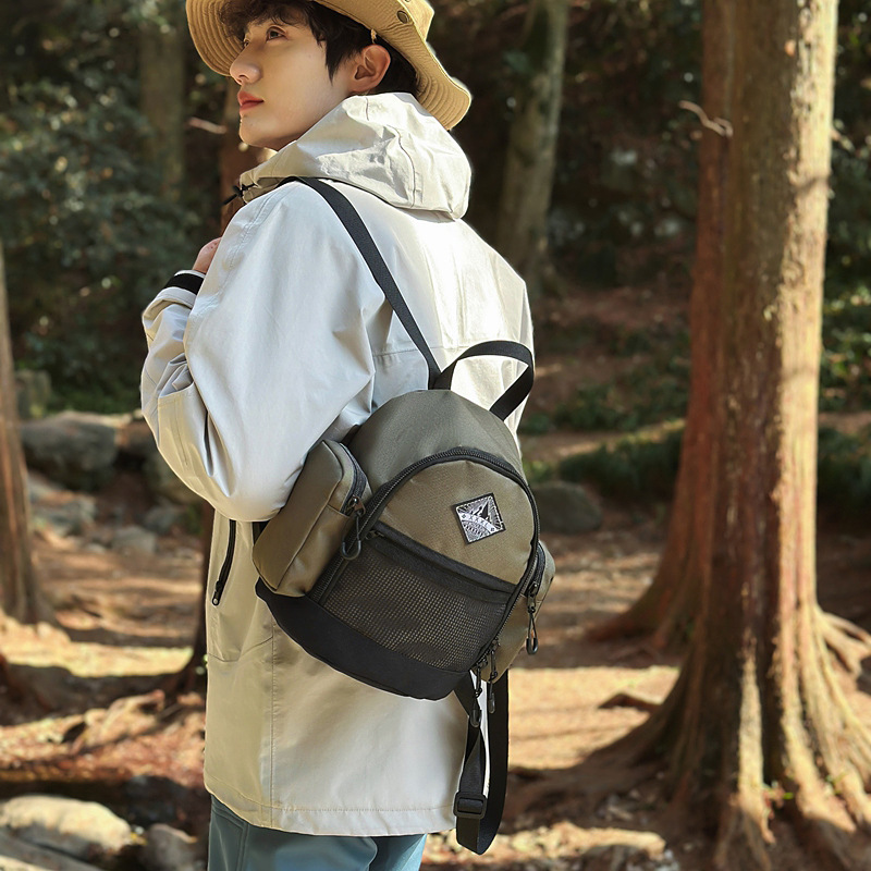 Outdoor sports backpack, casual and simple travel light backpack, Oxford fabric waterproof small and compact hiking backpack full figure
