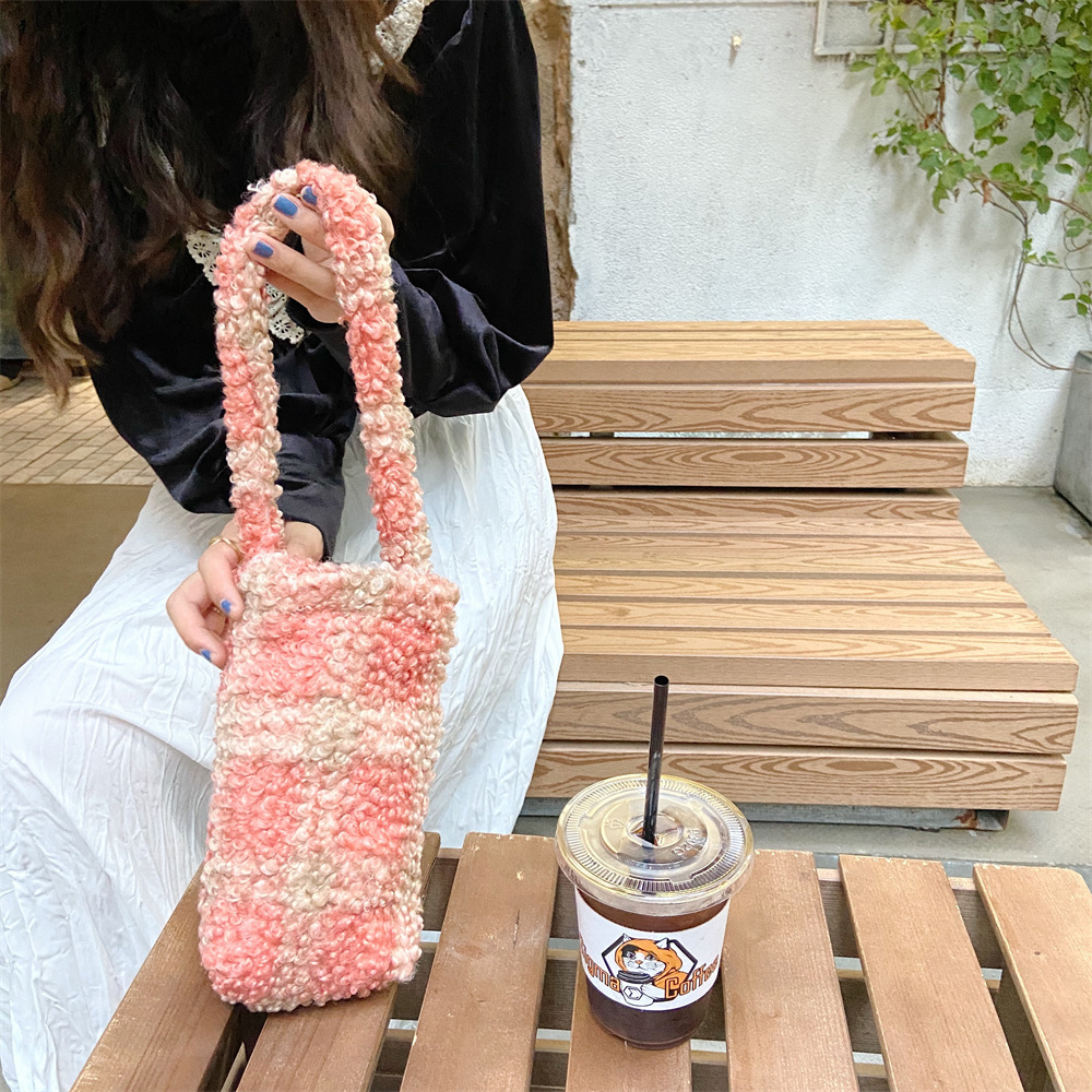 011181 Korean-style Instagram cute plush cow print student cup bag for class, hand-held check cup sleeve for commuting to work Application Scenario