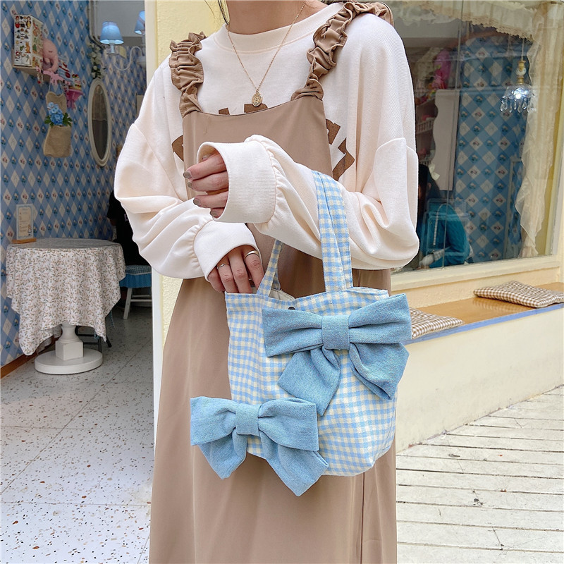 13141 New fresh checkered bow hand-held bento bag, cute girl Japanese-style student handbag wholesale details Picture