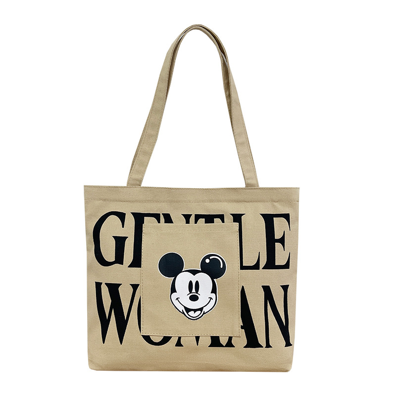 Large-capacity canvas bag for women, 2024 new trendy cartoon Mickey Mouse tote bag, single-shoulder tote bag for college students' classes Item Picture