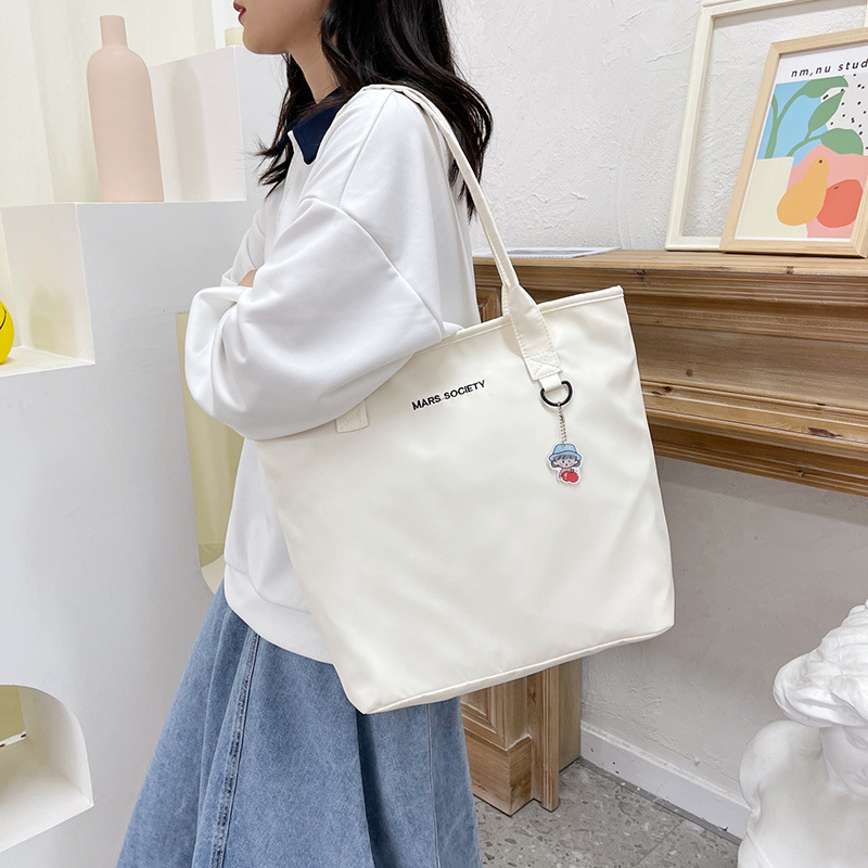 Japanese-style ins Harajuku large-capacity shopping bag, Korean-style chic casual and versatile, artistic student hand-held shoulder bag for girls Application Scenario