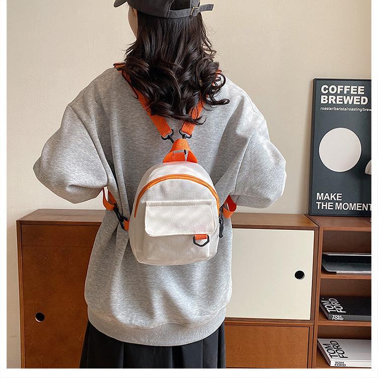 Korean-style casual, simple and retro solid-color Japanese-style canvas backpacks for women, student schoolbags, and a trend of women's commuting small backpacks undefined