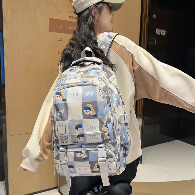 A cute Korean cartoon printed backpack for girls, large-capacity backpack for junior high school, senior high school and university, commuting and going out for primary school students Item Picture