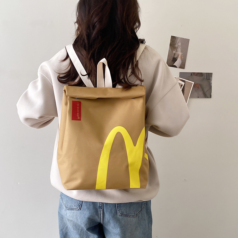 The new popular bags are McDonald's large-capacity backpacks, casual backpacks, hamburger paper bags, and student class bags Application Scenario