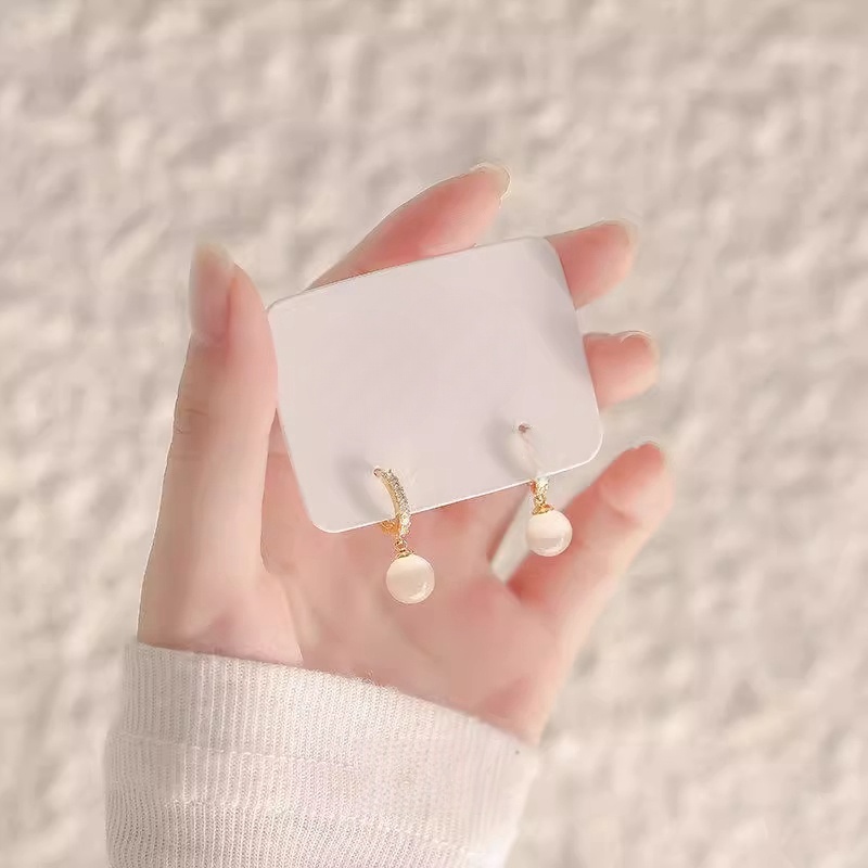 Xuhui brand exquisite and light luxury copper plated with real gold and set with zircon 925 silver needle and green jade, luxurious design and fashionable stud earrings full figure