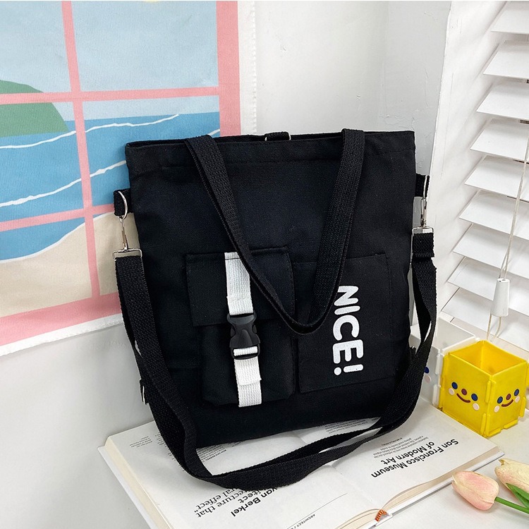 A large-capacity crossbody bag for spring 2024, featuring Japanese and Korean printed canvas for women and a student single-shoulder canvas bag with logo printing Application Scenario