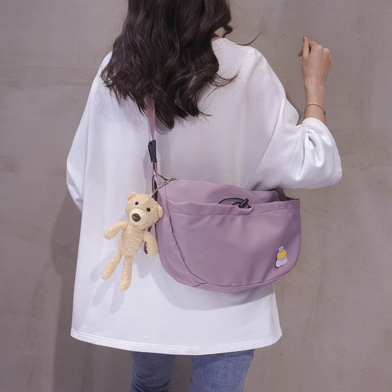 The new 2022 Little Bear canvas small bag for women is simple and versatile. The student dumpling bag is a trendy casual single-shoulder crossbody bag Application Scenario