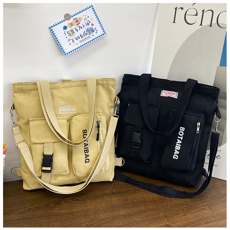 Fashionable and versatile canvas bags are selling well. New casual single-shoulder crossbody bag, double-shoulder schoolbag, large-capacity multi-purpose schoolbag for women details Picture