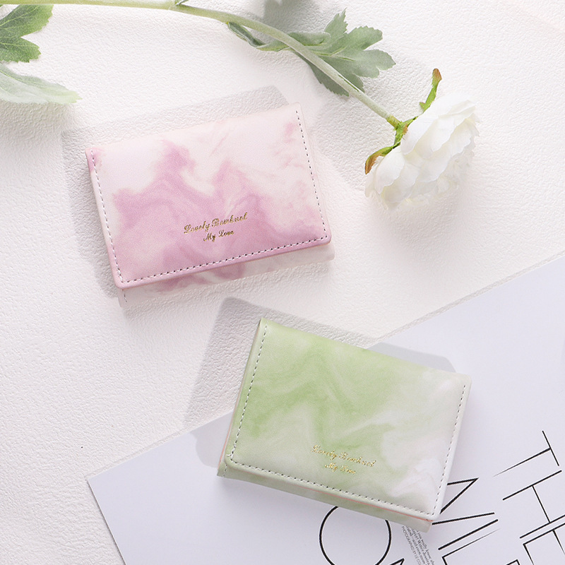 The 2024 new cartoon wallet features a cute little bear, a side zipper, a two-fold wallet, and is fashionable for women and students details Picture