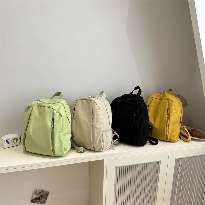 Wholesale retro and simple backpacks, new college-style student school bags, lightweight and versatile, campus travel backpacks details Picture