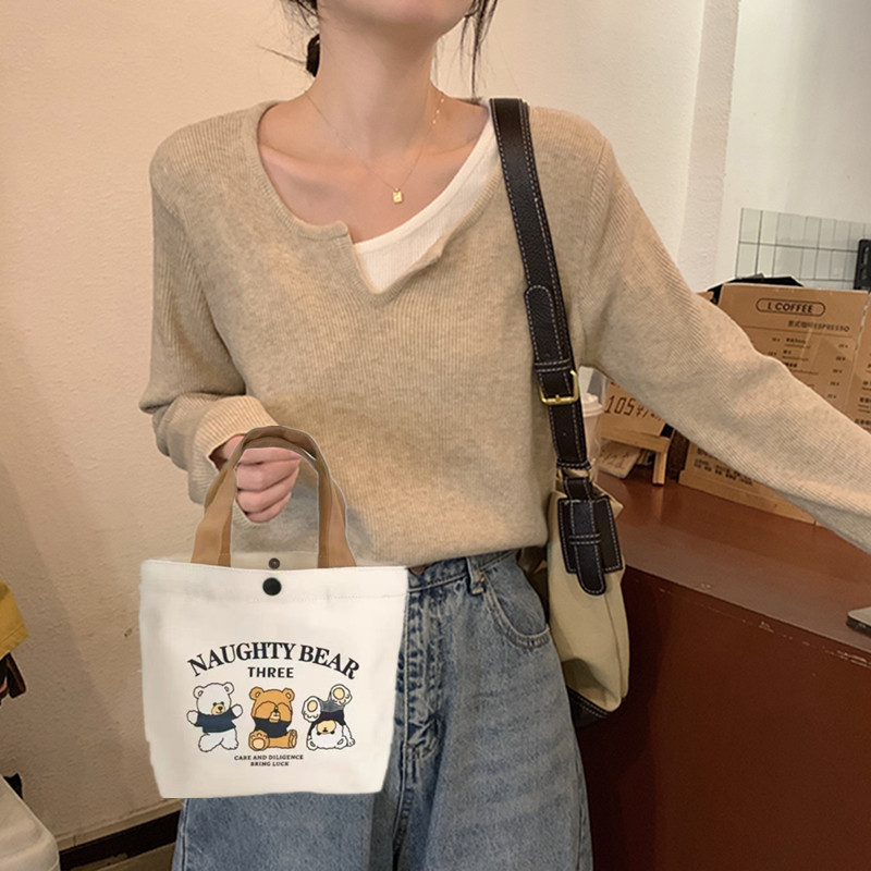 Canvas bag, small and versatile handbag, female student lunch box bag, simple hand-held bag, office worker lunch box bag full figure