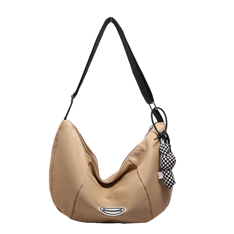 ins minimalist style nylon canvas large bag for women, large capacity, campus college students, crossbody single-shoulder versatile dumpling bag Item Picture